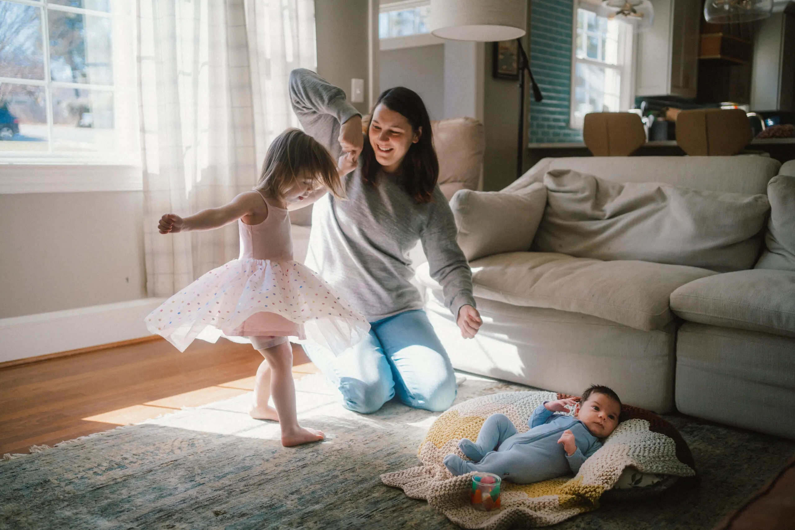 Natural light in-home family photographer Charlottesville Virginia - relaxed family photos in casual clothing with baby and toddler