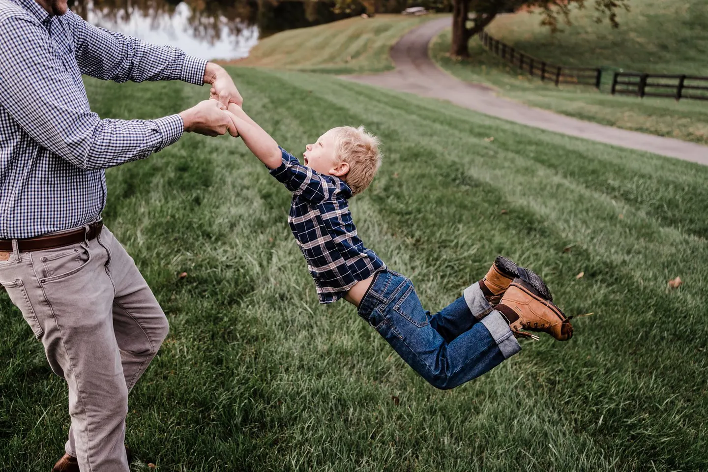 family photos with motion, dad swinging son