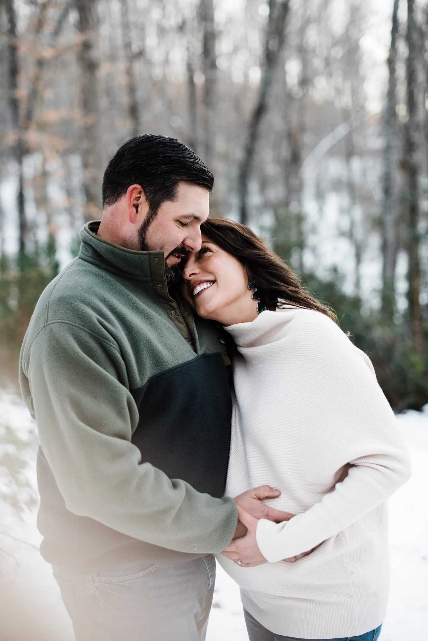 winter maternity session with couple in charlottesville virginia