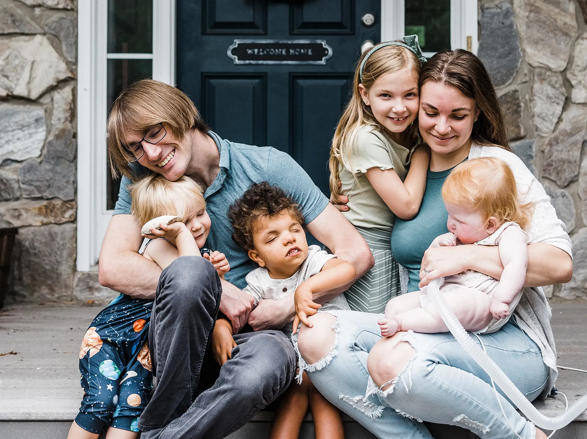 family photos with special needs kids at home on the front porch