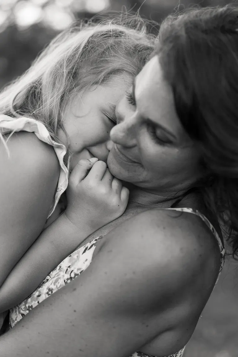 mother and daughter image in black and white