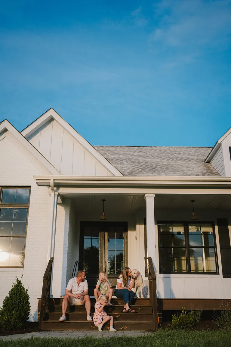 family photos on the front porch with dog, in-home photographer in Charlottesville VA